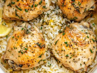Slow Cooker Lemon Herb Chicken served with fresh herbs and lemon slices